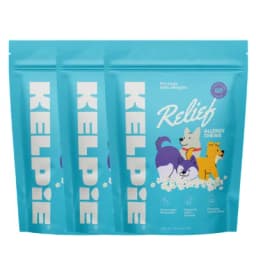Three teal pouches of Kelp Pie Relief Allergy Chews for dogs with allergies, featuring cartoon dogs